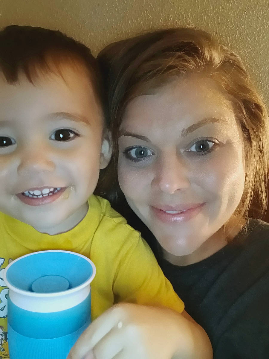 Luke is registered to the contest to win money with this photo: cheek, child, drinkware, eyebrow, eyelash, finger, fun, gesture, hand, happy, iris, joy, lip, mouth, nose, person, selfie, skin, smile, t_shirt