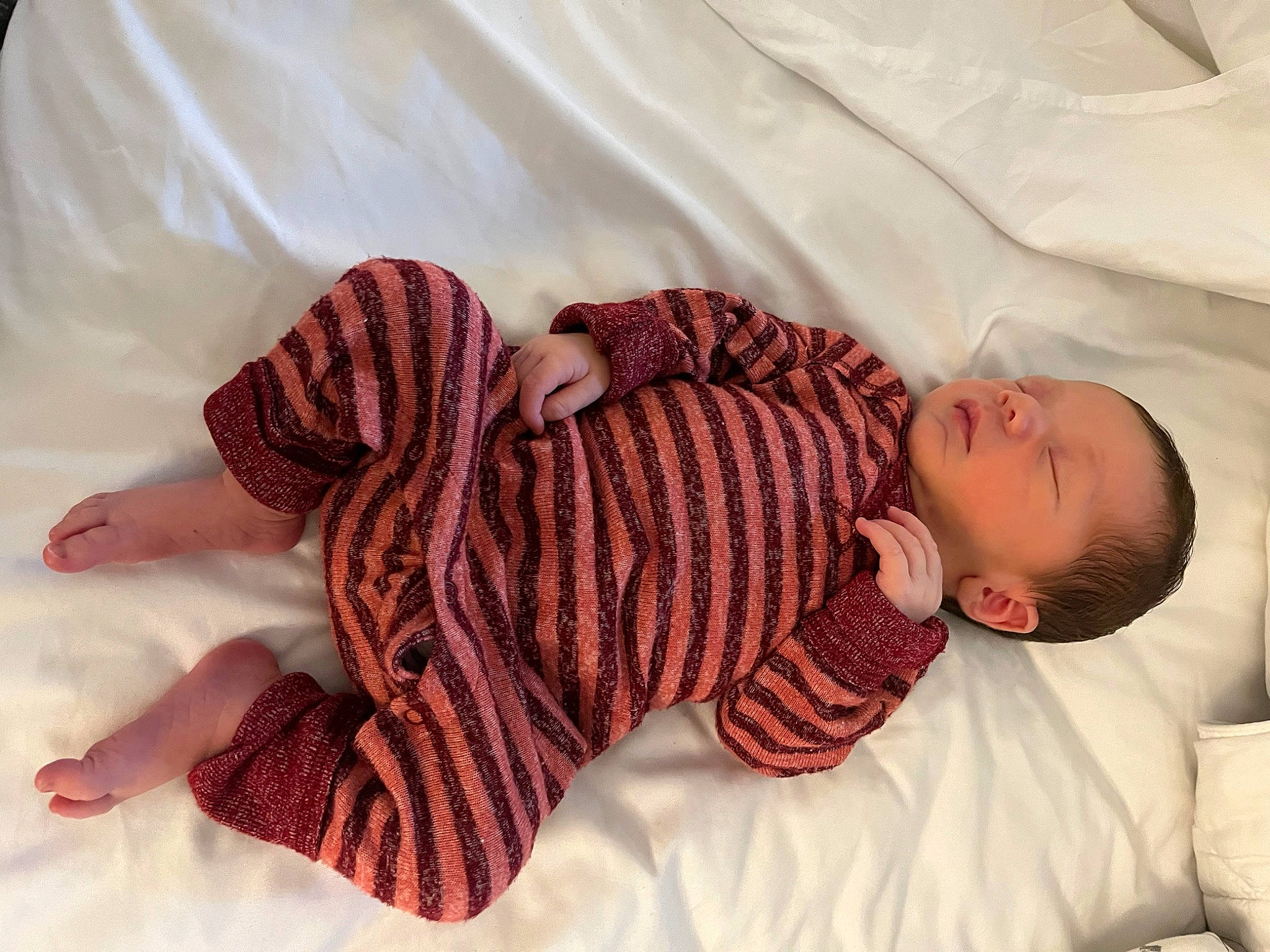 Lakota is registered to the contest to win money with this photo: baby, baby_products, baby_safety, baby_sleeping, baby_toddler_clothing, bedding, child, comfort, craft, creative_arts, linens, magenta, pattern, person, sleeve, thread, thumb, toddler, wool, woolen