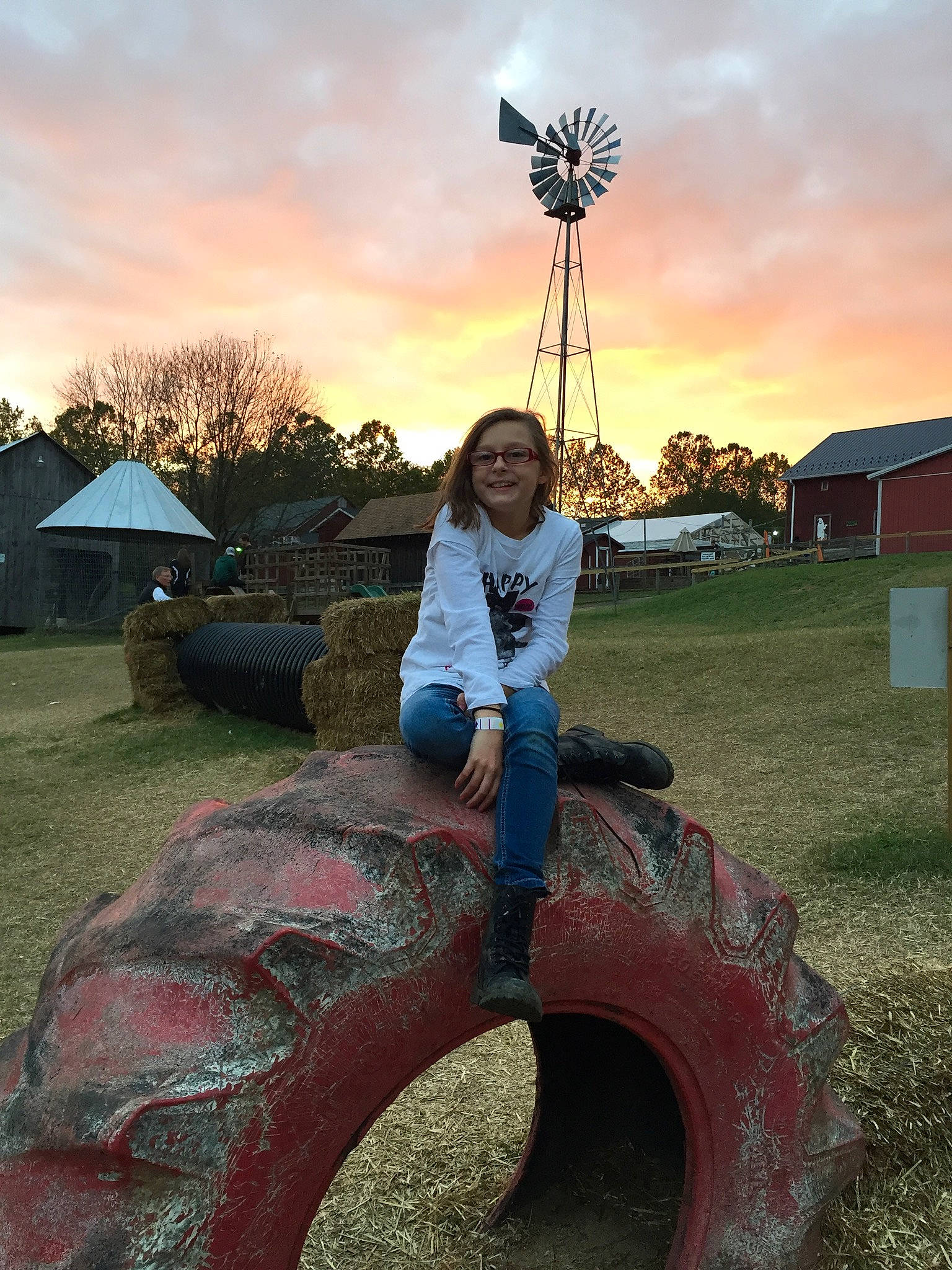 Shayla is registered to the contest to win money with this photo: fun, girl, grass, joy, landscape, person, plant, recreation, sky, sunlight, tree, vacation