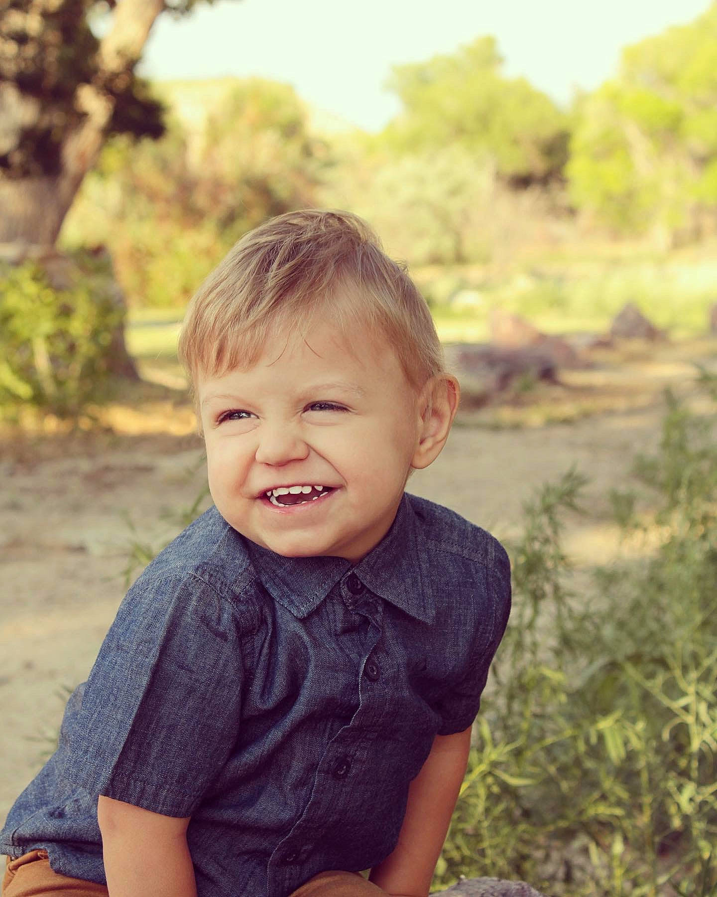 Xander joined the competition — help win amazing prizes! baby_toddler_clothing, eye, face, facial_expression, flash_photography, grass, happy, head, iris, leisure, people_in_nature, person, plant, skin, smile, summer, sunlight, t_shirt, toddler, tree