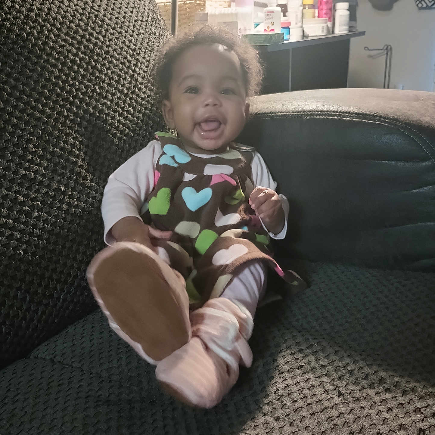 Ja'Miria is registered to the contest to win money with this photo: architecture, building, child, couch, cushion, cutlery, face, female, furniture, girl, head, homedecor, indoors, livingroom, person, photography, portrait, room, sitting, spoon