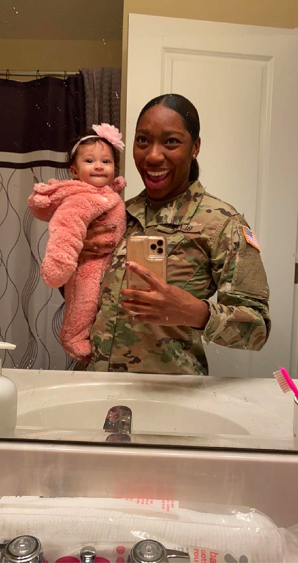 Gianna joined the competition — help win amazing prizes! army, camouflage, curtain, gesture, head, jacket, joy, marines, military_camouflage, military_officer, military_organization, military_person, military_uniform, mirror, non_commissioned_officer, person, shirt, smile, soldier, standing