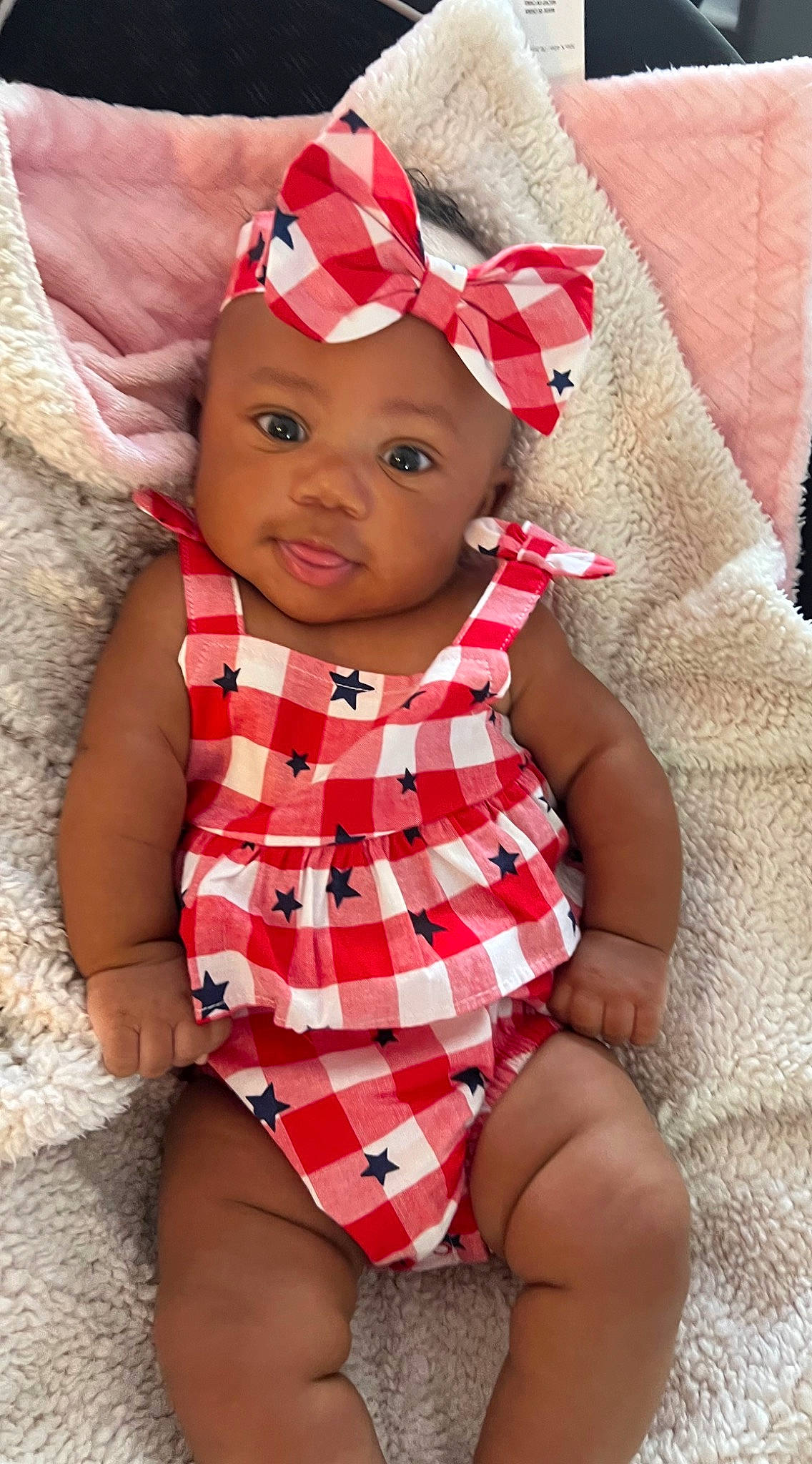 Mariana is registered to the contest to win money with this photo: baby, baby_toddler_clothing, cap, child, dress, eye, face, finger, foot, fun, happy, headwear, lip, pattern, person, pink, red, skin, sleeve, textile