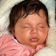 Sinaï participe au concours pour gagner de l'argent avec cette photo : baby, sleeping, blanket, pink_clothing, face, infant, soft_texture, cozy, child, peaceful, cute, closeup, wrapped, warm, portrait, adorable, head, skin, eyelashes, mouth