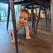 Roman joined the competition — help win amazing prizes! baby, chair, child, crawling, cute, eyes, flooring, furniture, hands, happy, head, home, indoor, natural_light, person, playful, smiling, striped_shirt, wooden_floor, young_child