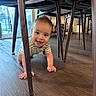 baby, chair, child, crawling, cute, eyes, flooring, furniture, hands, happy, head, home, indoor, natural_light, person, playful, smiling, striped_shirt, wooden_floor, young_child