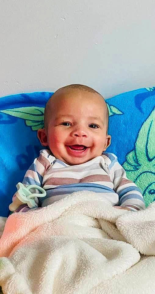 Phoenix joined the competition — help win amazing prizes! baby, baby_products, baby_toddler_clothing, cheek, child, comfort, fun, happy, iris, joy, laugh, linens, pattern, person, portrait_photography, room, sitting, sleeve, smile, t_shirt