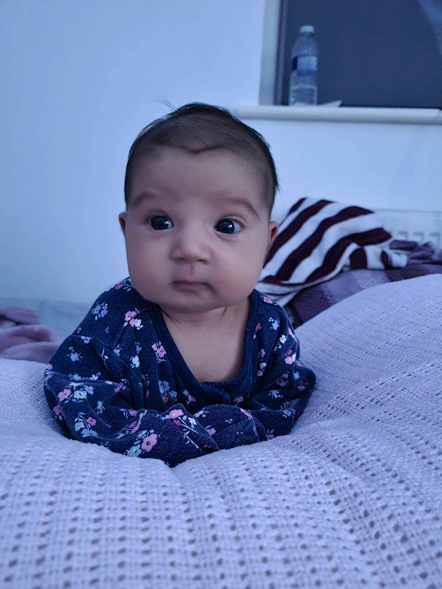 Daria is registered to the contest to win money with this photo: baby, baby_toddler_clothing, cheek, child, comfort, eye, eyebrow, floor, flooring, iris, linens, lip, mouth, nose, person, photography, sitting, skin, textile, toddler