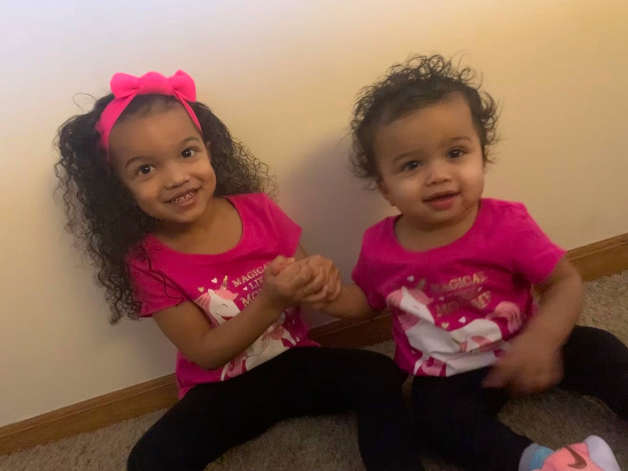 Maliyah is registered to the contest to win money with this photo: cheek, child, face, fun, hairstyle, happy, head, joy, leg, lip, mouth, neck, people, person, pink, play, shoulder, sibling, sitting, skin