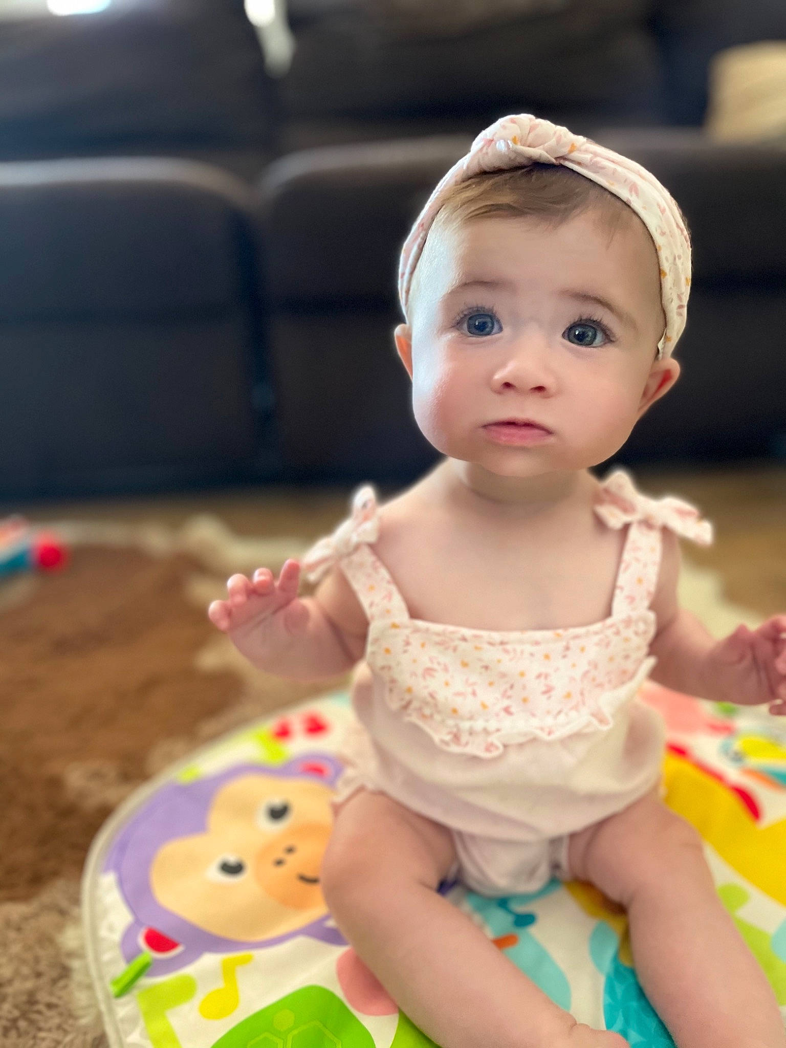 Clementine is registered to the contest to win money with this photo: baby, baby_toddler_clothing, birthday, cheek, child, dress, event, fashion_accessory, fun, happy, iris, jewellery, leisure, people, person, pink, play, sitting, skin, sweetness