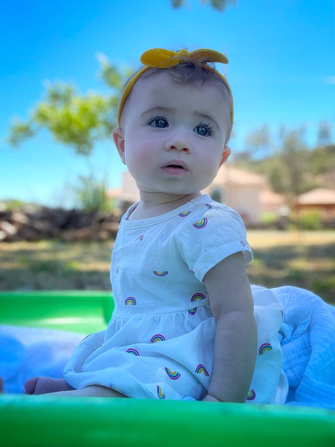 Clementine is registered to the contest to win money with this photo: azure, baby, baby_toddler_clothing, electric_blue, eye, flash_photography, fun, grass, happy, iris, leisure, people_in_nature, person, plant, recreation, skin, sky, sleeve, summer, toddler