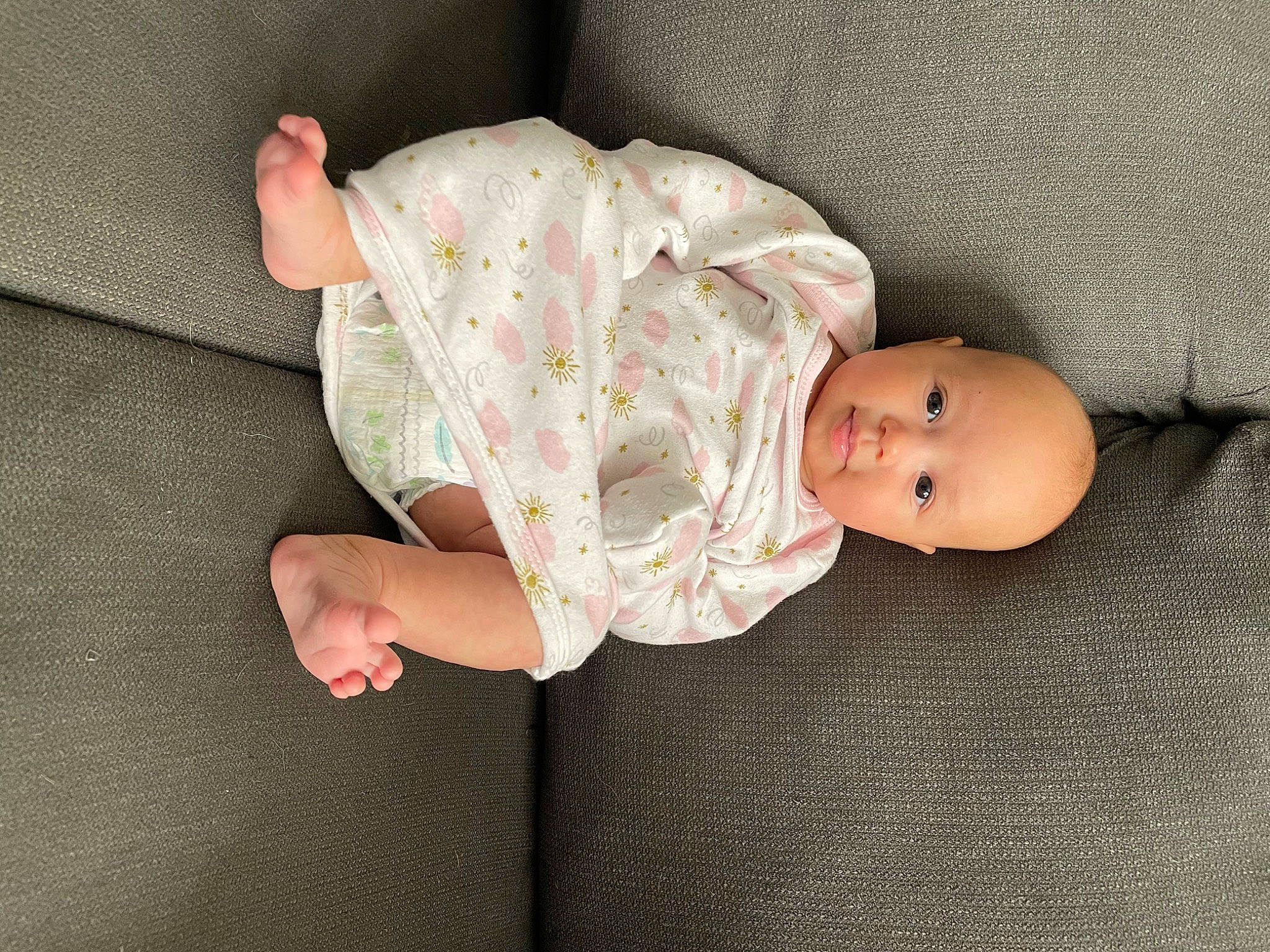Calli joined the competition — help win amazing prizes! arm, baby, baby_toddler_clothing, child, comfort, eye, finger, head, human_body, leg, linens, mammal, person, pink, product, sitting, skin, sleeve, textile, toddler