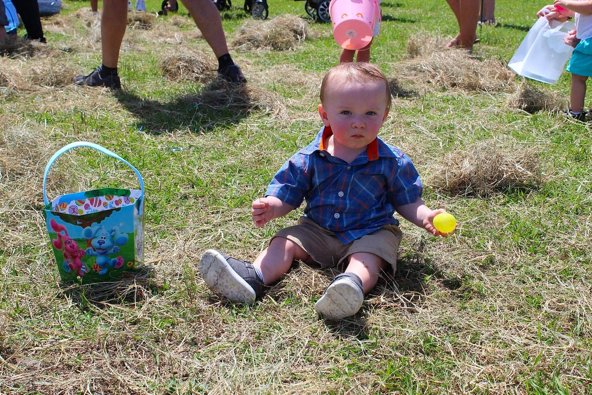 Mark is registered to the contest to win money with this photo: ball, child, event, fun, grass, grass_family, green, hat, lawn, leisure, people, people_in_nature, person, play, recreation, shoe, shorts, soil, summer, toddler