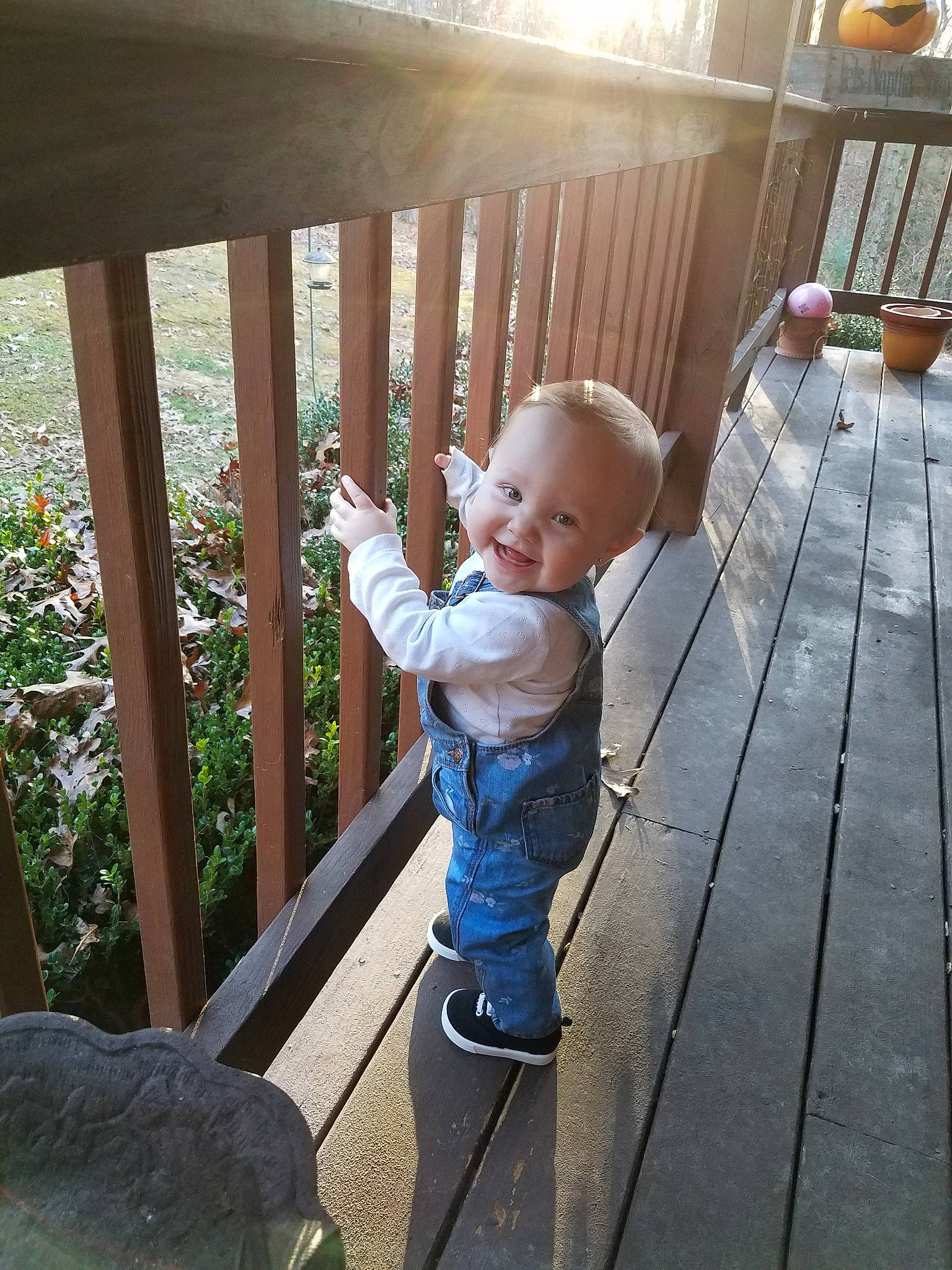 Sailor is registered to the contest to win money with this photo: child, day, fun, girl, house, infant, joy, outdoor_structure, person, play, product, recreation, sitting, standing, toddler, vacation