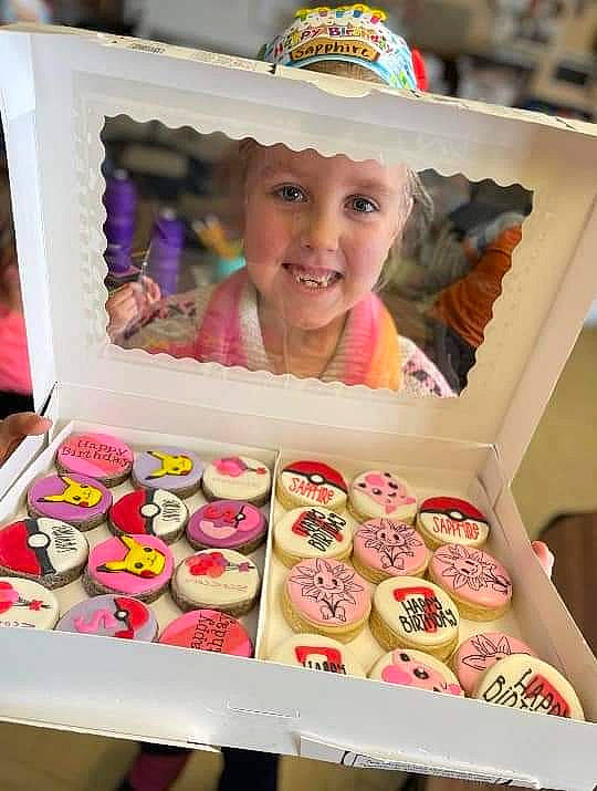 Sapphire joined the competition — help win amazing prizes! baking, cap, child, comfort_food, cuisine, event, eyelash, fashion_accessory, finger_food, food, happy, hat, headwear, joy, paint, peach, person, pink, recipe, smile