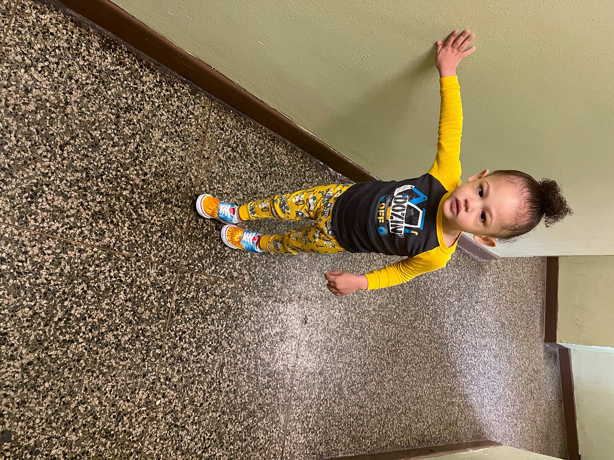 Lucious is registered to the contest to win money with this photo: asphalt, baby, baby_toddler_clothing, balance, child, comfort, floor, flooring, fun, happy, human_leg, knee, person, road_surface, room, shadow, sitting, sportswear, tar, toddler