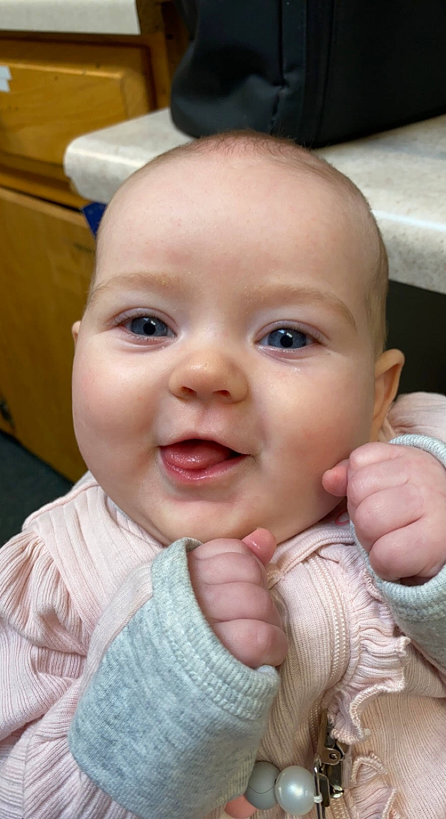 Maisie joined the competition — help win amazing prizes! baby, baby_toddler_clothing, cheek, chin, eye, eyelash, face, facial_expression, finger, gesture, hand, happy, head, iris, lip, mouth, nose, person, skin, smile
