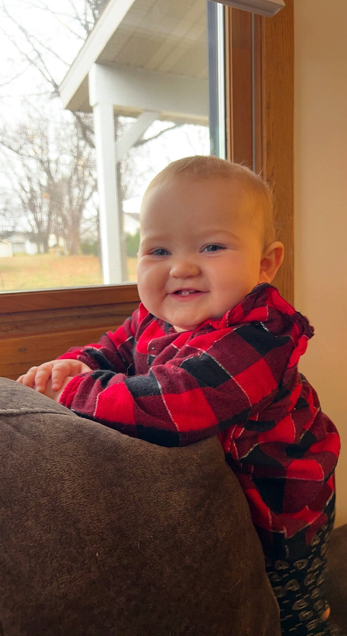 Maisie is registered to the contest to win money with this photo: baby, baby_toddler_clothing, cheek, chin, collar, comfort, eye, face, hair, hairstyle, head, human_body, iris, joy, lip, person, plaid, skin, sleeve, smile