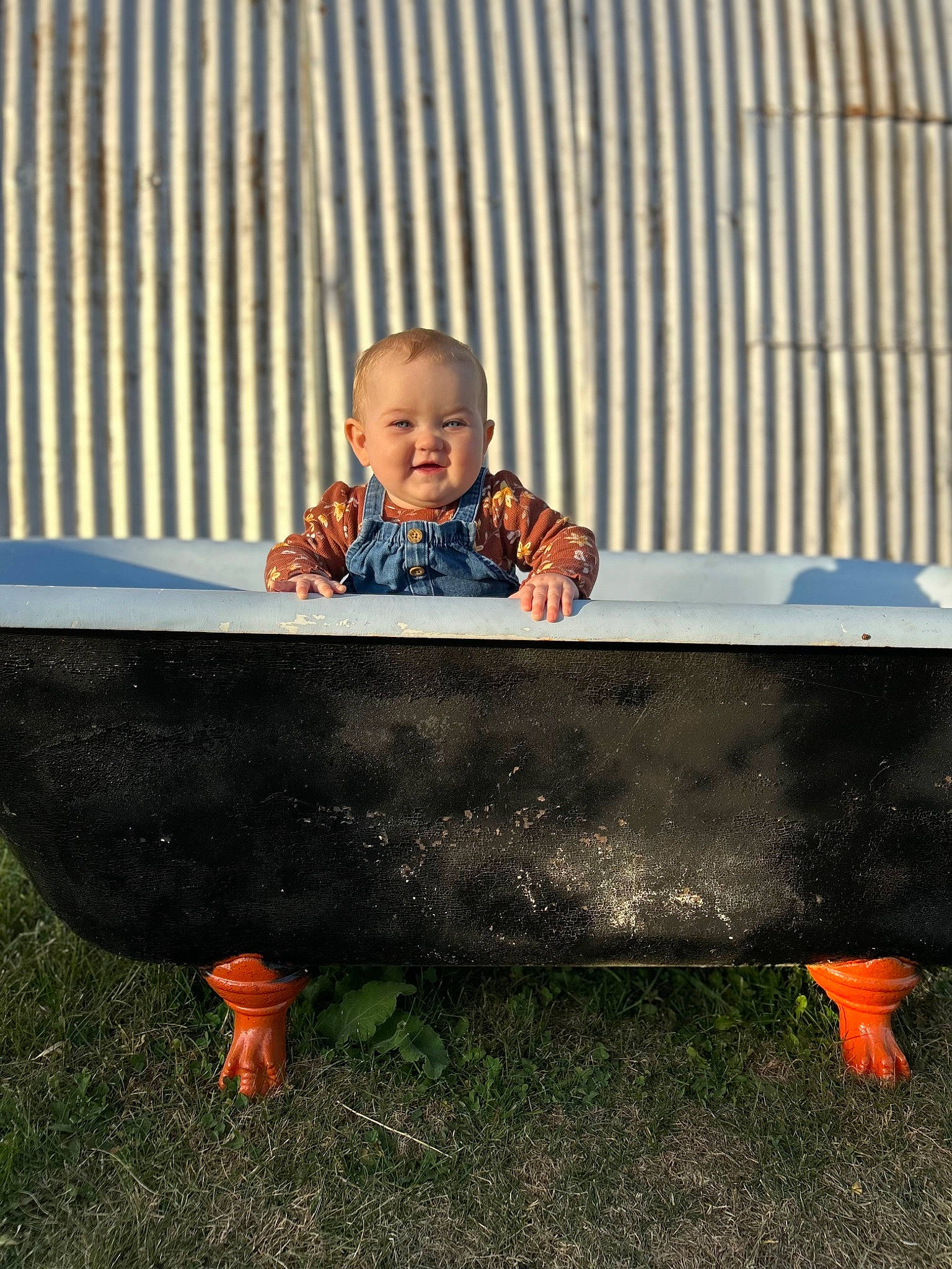 Maisie joined the competition — help win amazing prizes! child, composite_material, concrete, fun, grass, happy, leisure, person, recreation, rectangle, sitting, smile, toddler, wood
