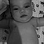 Inaya participe au concours pour gagner de l'argent avec cette photo : arms, baby, blanket, chest, child, coffee, cute, diaper, expressionless, eyes, face, head, indoors, infant, lying_down, monochrome, mouth, pattern, portrait, skin