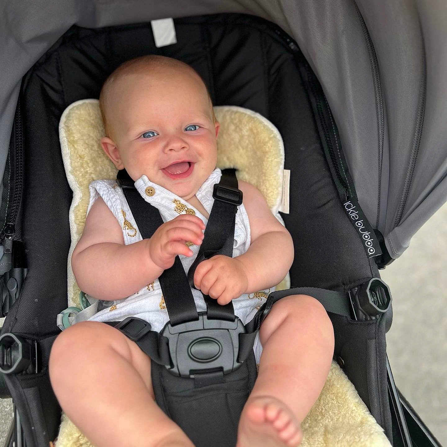 Arlo joined the competition — help win amazing prizes! accessories, architecture, baby, babylaughing, building, car, face, happy, head, outdoors, person, photography, portrait, shelter, smile, strap, stroller, sunglasses, transportation, vehicle