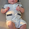 Isaac joined the competition — help win amazing prizes! baby, infant, sailor_outfit, hat, white_clothing, lying_down, cute, chubby_cheeks, soft_lighting, indoors, smiling, baby_toddler, portrait, child, skin, feet, hands, expression, comfortable, adorable