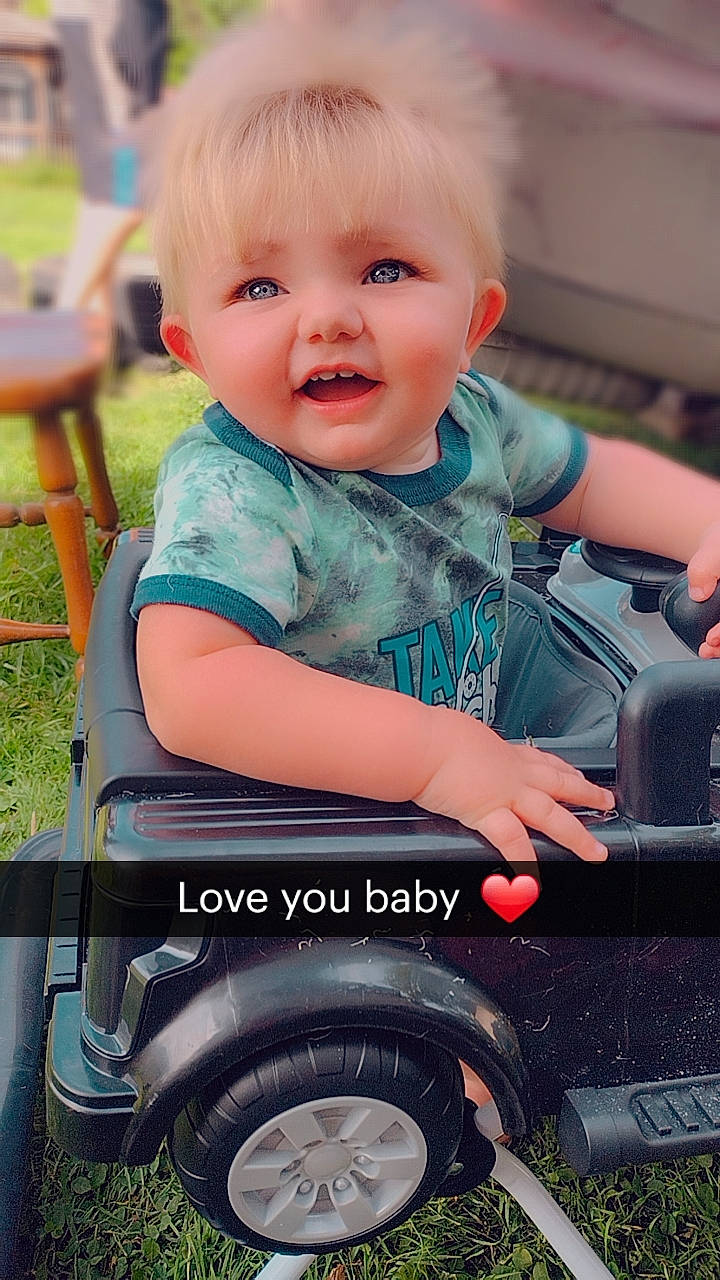 Kamran is registered to the contest to win money with this photo: automotive_tire, baby, baby_carriage, baby_toddler_clothing, beauty, child, eye, flash_photography, fun, happy, iris, motor_vehicle, people, person, photograph, product, smile, snapshot, tire, toddler