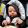 baby, infant, hood, car_seat, blanket, safety_strap, child, cute, face, hands, clothing, seatbelt, indoors, closeup, portrait, smile, soft, warm, baby_boy, restraint