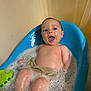 baby, bathtub, bath, bubbles, child, foam, happy, infant, kid, playful, plastic_tub, portrait, water, wet_skin, bathroom, toy, towel, skin, smile, young_child