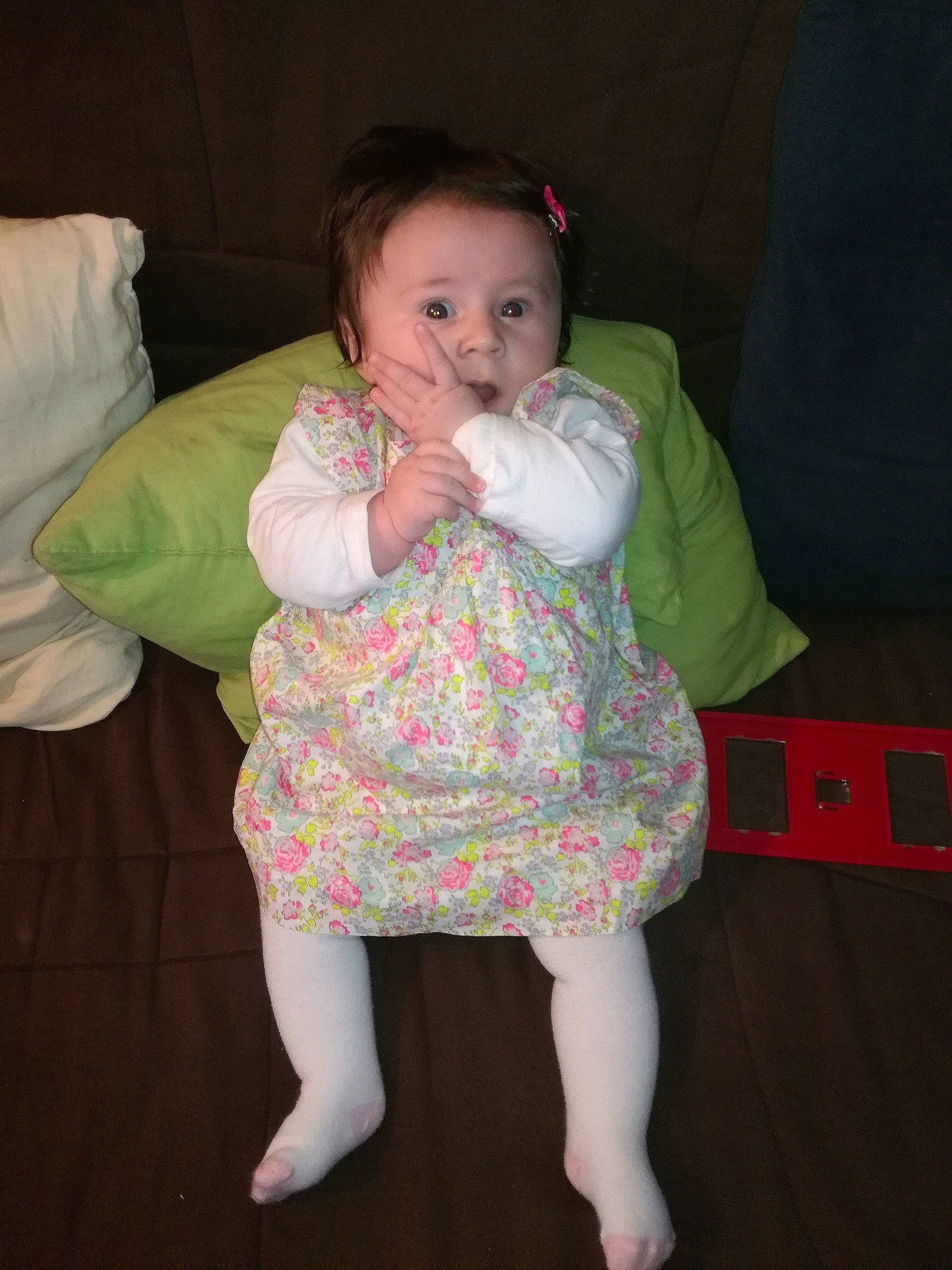 Camila participe au concours pour gagner de l'argent avec cette photo : baby, baby_toddler_clothing, cheek, child, dress, iris, person, pink, sitting, skin, smile, toddler