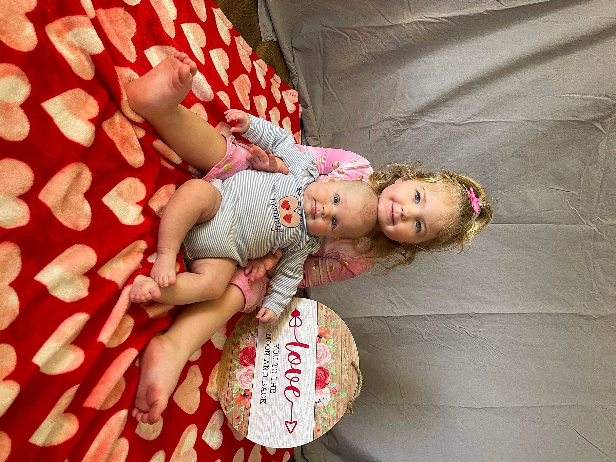 Jocelyn joined the competition — help win amazing prizes! arm, baby, baby_toddler_clothing, child, comfort, event, finger, hand, happy, human_body, human_leg, joy, leg, nail, pattern, person, pink, skin, sleeve, textile