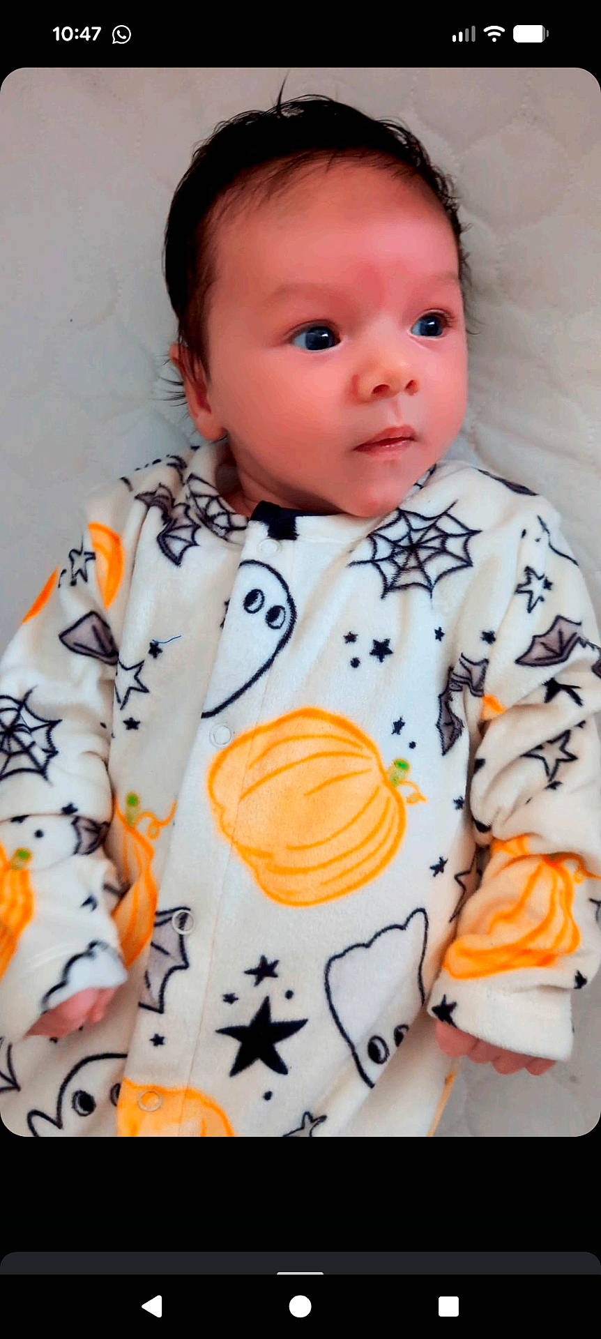 baby, child, cozy, cute, expression, face, ghost, halloween, hand, head, indoor, infant, lying_down, onesie, portrait, pumpkin, sleepwear, soft, spider_web, stars