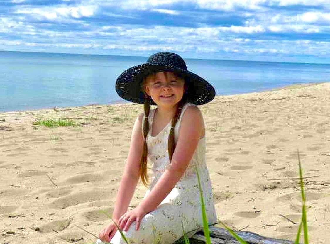 Kaidence is registered to the contest to win money with this photo: azure, beach, blue, cloud, coastal_and_oceanic_landforms, flash_photography, fun, happy, hat, headgear, headwear, joy, landscape, people_in_nature, people_on_beach, person, plant, sand, sky, smile
