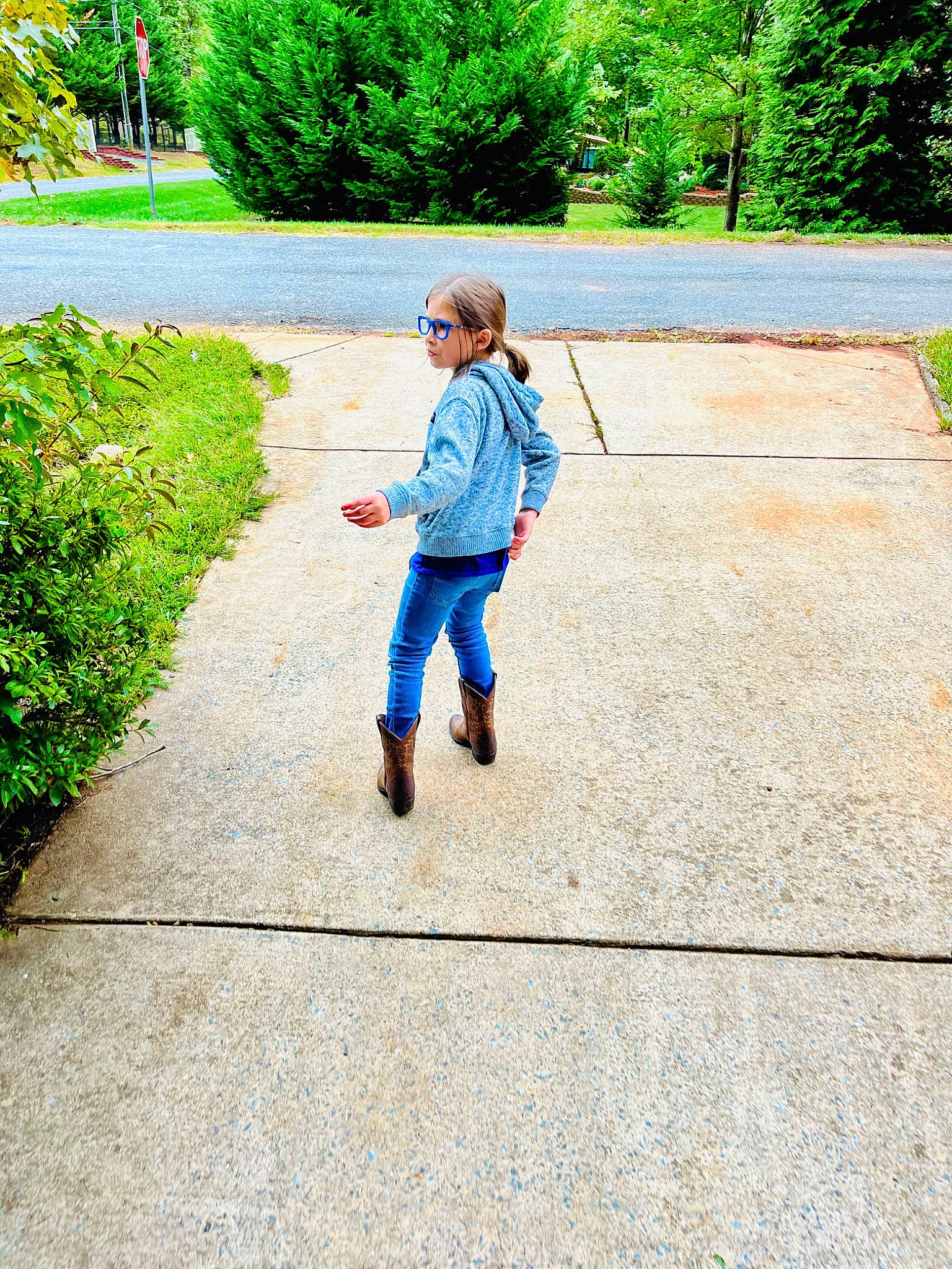 Lilyanne is registered to the contest to win money with this photo: asphalt, denim, electric_blue, gesture, grass, green, human_leg, landscape, leisure, people_in_nature, person, plant, recreation, road, road_surface, shadow, sidewalk, tints_and_shades, tree, walking