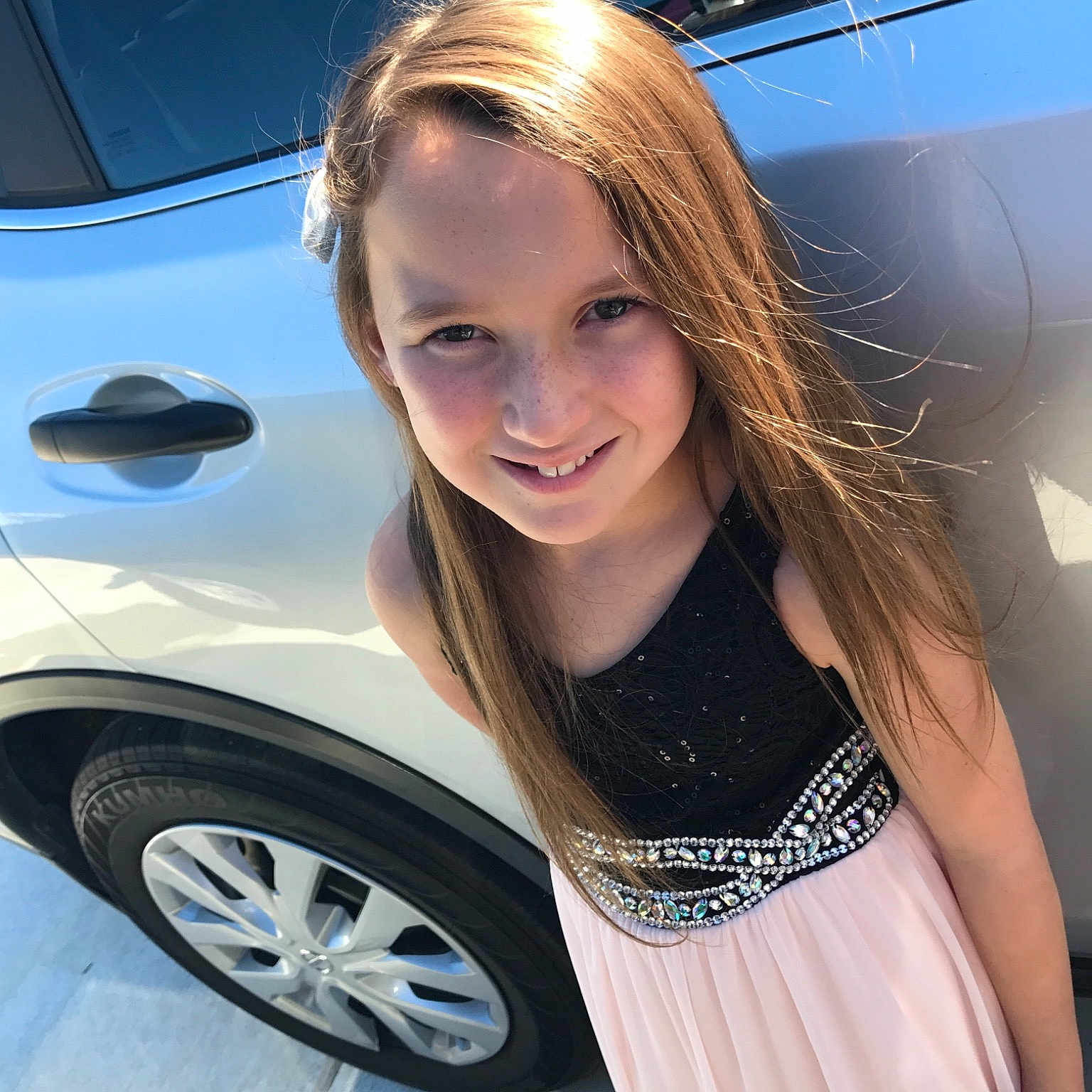Megan is registered to the contest to win money with this photo: auto_show, automotive_design, automotive_wheel_system, beauty, blond, brown_hair, car, hair, headlamp, joy, long_hair, luxury_vehicle, model, motor_vehicle, person, personal_luxury_car, photo_shoot, rim, tire, vehicle