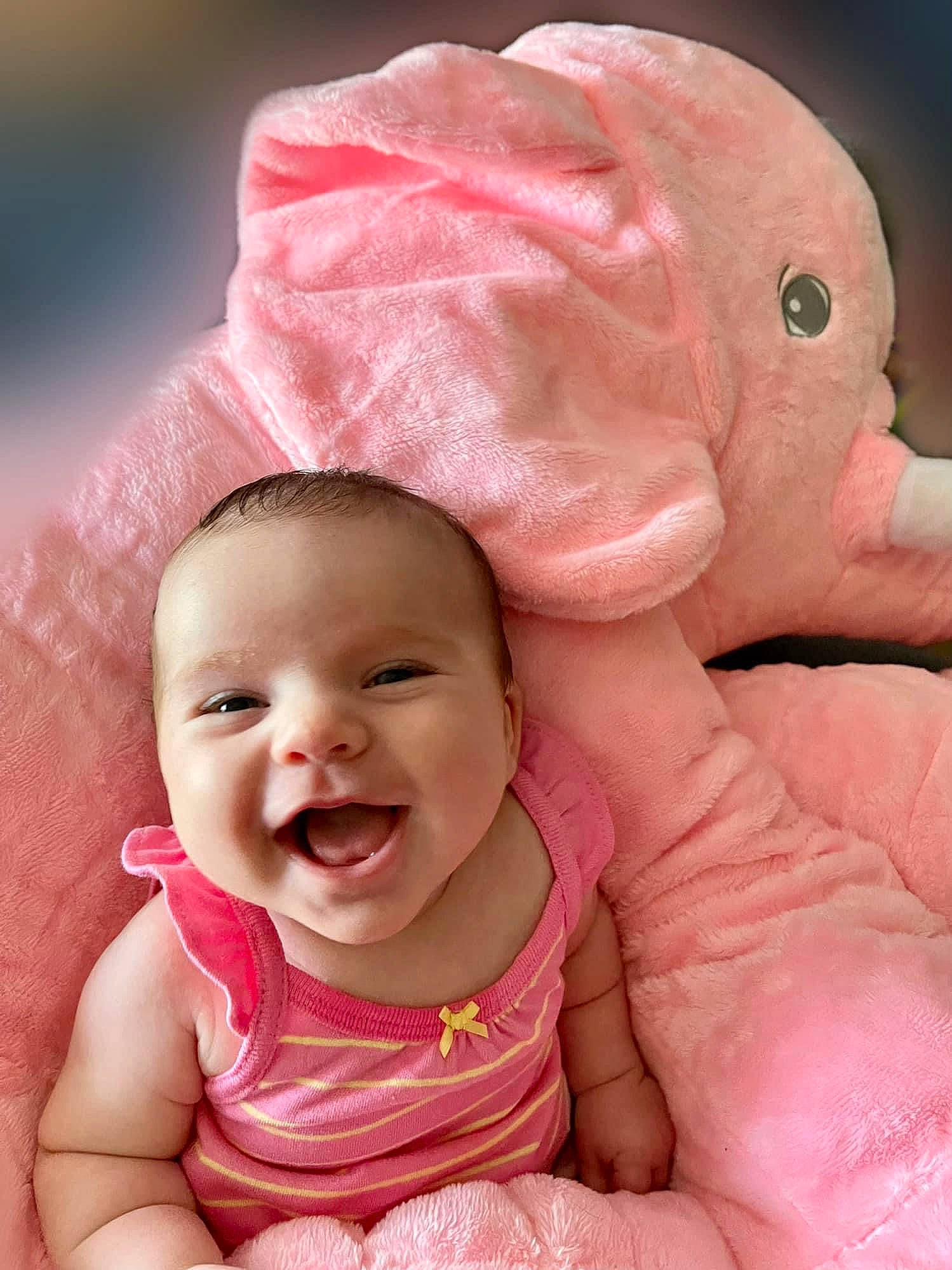 Julie is registered to the contest to win money with this photo: baby, baby_toddler_clothing, cheek, chin, eye, face, gesture, happy, head, headwear, human, joy, lip, mammal, mouth, muscle, nose, organ, person, pink