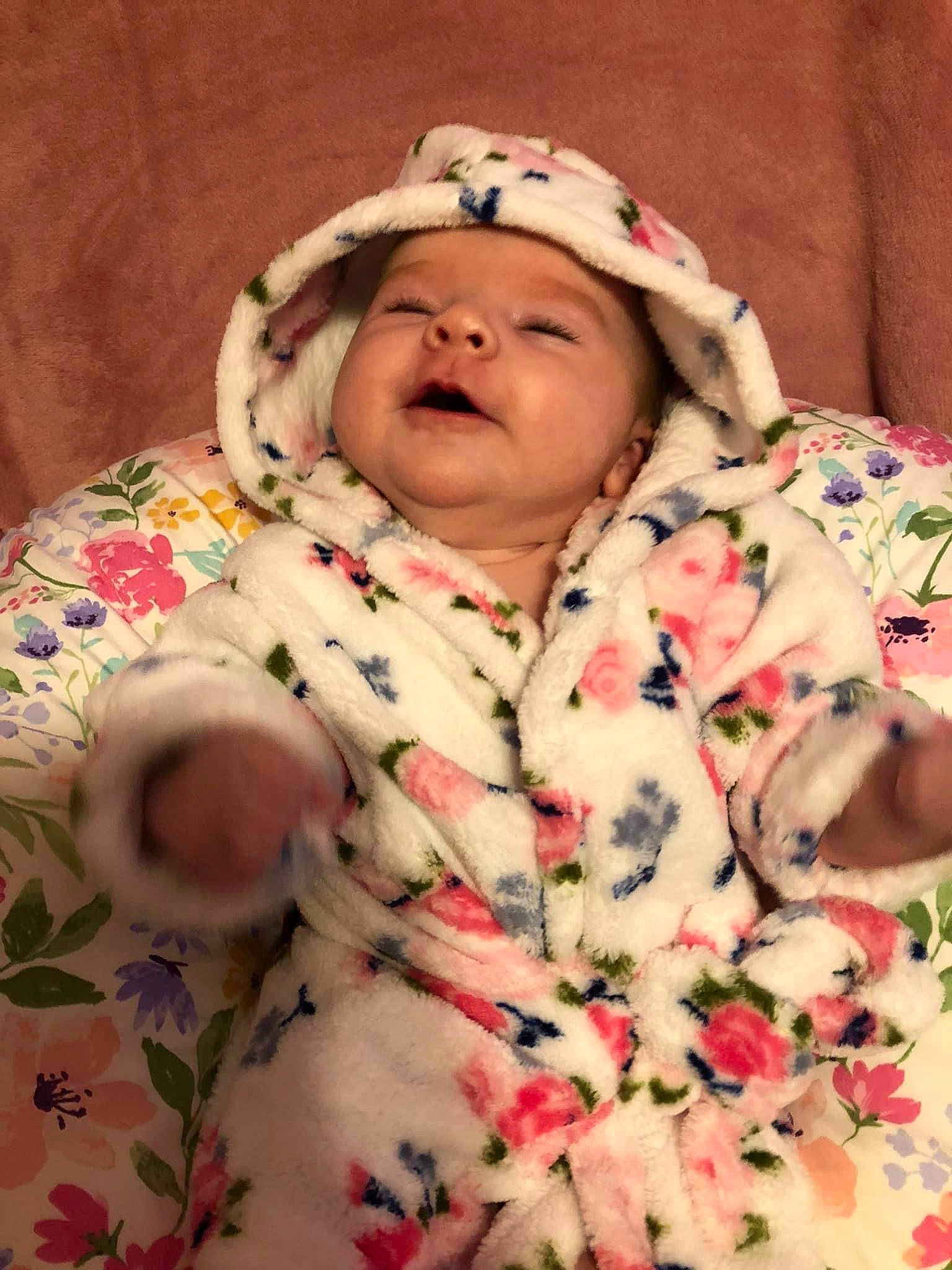 Julie is registered to the contest to win money with this photo: baby, baby_sleeping, baby_toddler_clothing, bedtime, cheek, child, collar, comfort, eye, fur, head, headwear, linens, lip, outerwear, pattern, person, pink, skin, sleeve