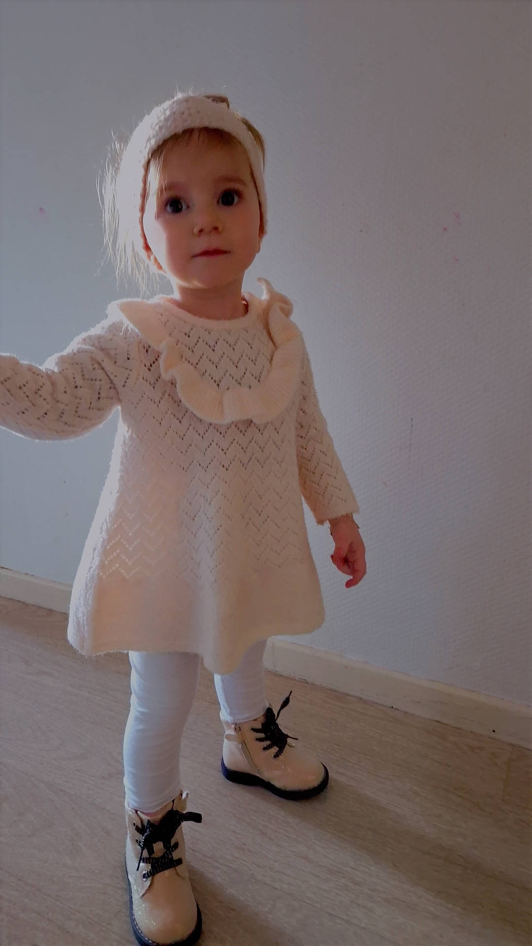 Thalya participe au concours pour gagner de l'argent avec cette photo : baby_toddler_clothing, child, dress, embellishment, fashion_design, footwear, gesture, hairstyle, hand, human_body, iris, joint, neck, outerwear, person, pink, skin, sleeve, toy, waist