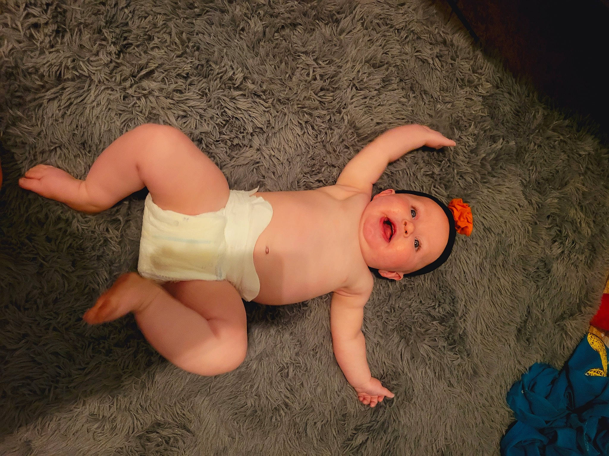 Ava joined the competition — help win amazing prizes! abdomen, baby, barefoot, chest, fawn, finger, foot, fun, grass, human_body, knee, leg, mouth, organism, person, skin, stomach, thigh, toy, trunk