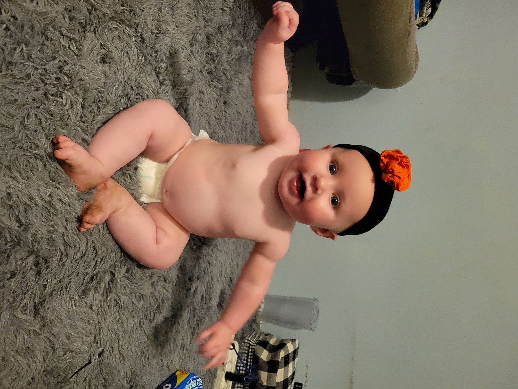 Ava joined the competition — help win amazing prizes! abdomen, baby, barechested, black_hair, chest, child, chin, elbow, eyelash, flash_photography, happy, headwear, human_leg, person, skin, smile, stomach, thigh, toddler, trunk