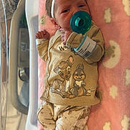 Raelynn Grace joined the competition — help win amazing prizes! newborn, baby, pacifier, headband, blanket, hospital, pajamas, cartoon_characters, teddy_bear, cloud_pattern, infant, sleeping, soft_texture, cute, child, lying_down, hospital_bracelet, striped_sock, baby_clothes, portrait