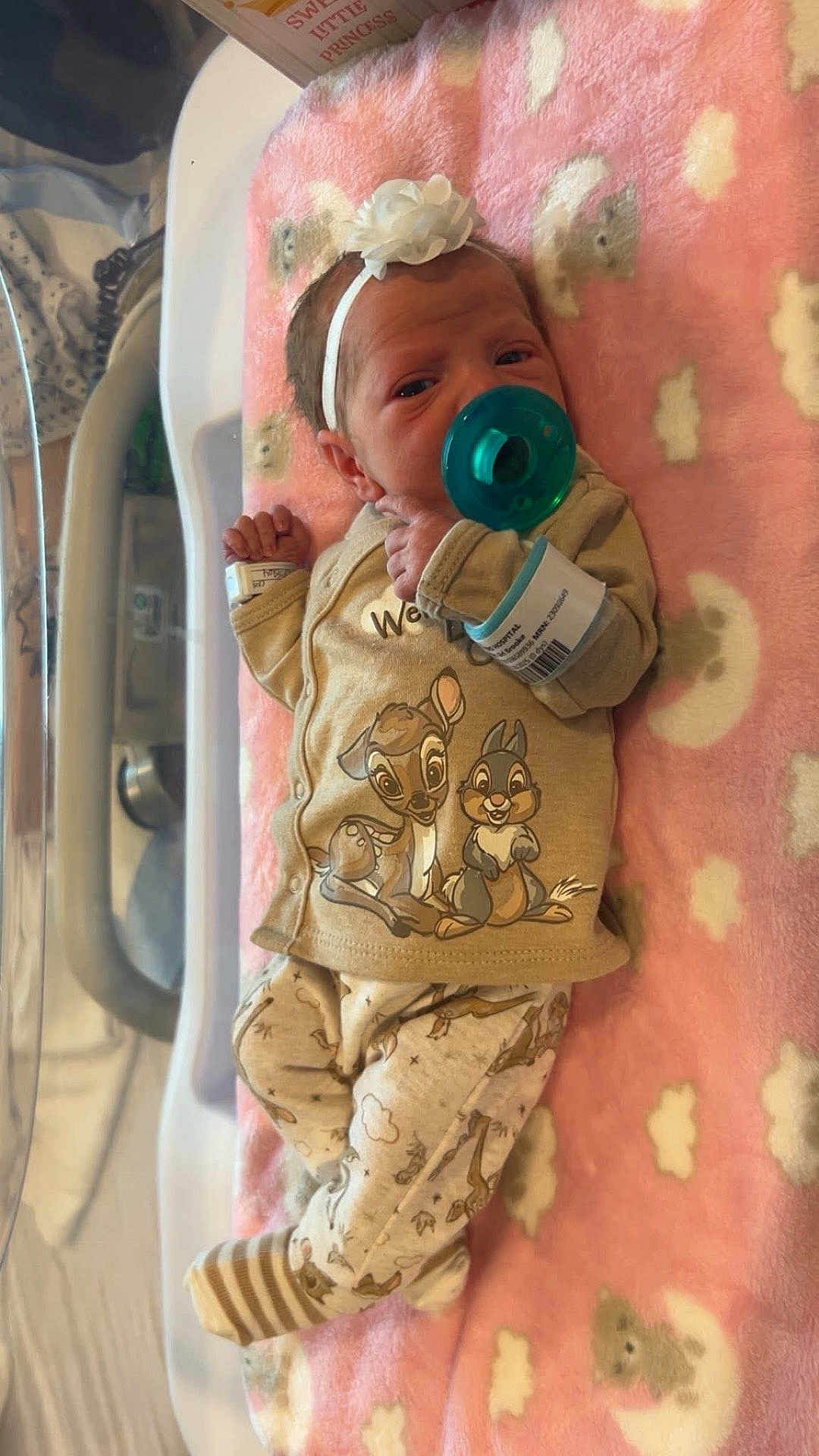 Raelynn Grace joined the competition — help win amazing prizes! newborn, baby, pacifier, headband, blanket, hospital, pajamas, cartoon_characters, teddy_bear, cloud_pattern, infant, sleeping, soft_texture, cute, child, lying_down, hospital_bracelet, striped_sock, baby_clothes, portrait