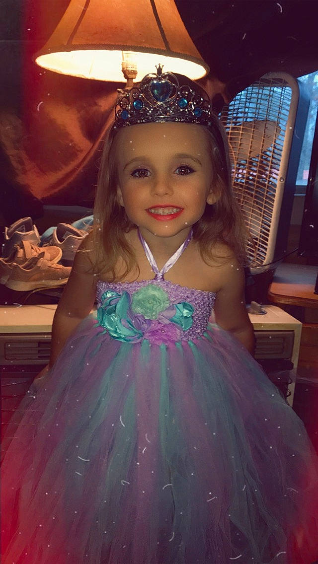 Kendall joined the competition — help win amazing prizes! ballet_tutu, child, child_model, clothing, costume, doll, dress, formal_wear, gown, hair_accessory, headpiece, headwear, iris, joy, person, pink, smile, tiara, toddler