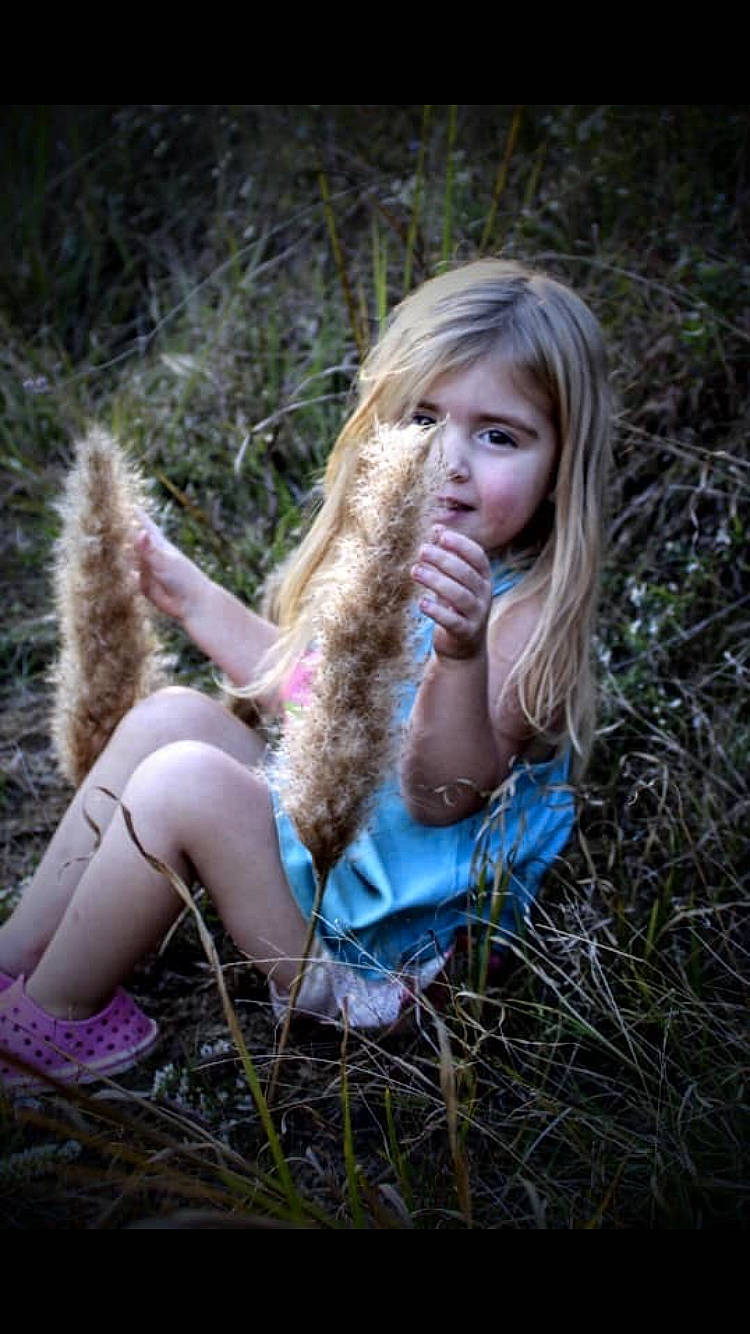 Makenna is registered to the contest to win money with this photo: beauty, blond, child_model, fawn, forest, fur, grass, hair, long_hair, model, people_in_nature, person, photo_shoot, photography, plant, portrait, portrait_photography, sitting, smile, tree