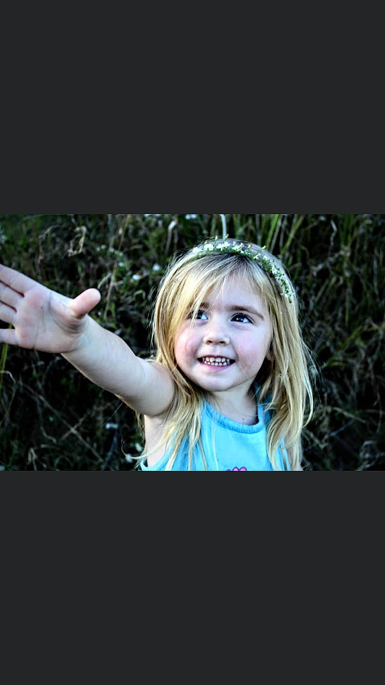 Makenna joined the competition — help win amazing prizes! beauty, blond, child, child_model, eye, face, fun, gesture, grass, green, hair, hairstyle, hand, joy, long_hair, person, photograph, photography, portrait, portrait_photography