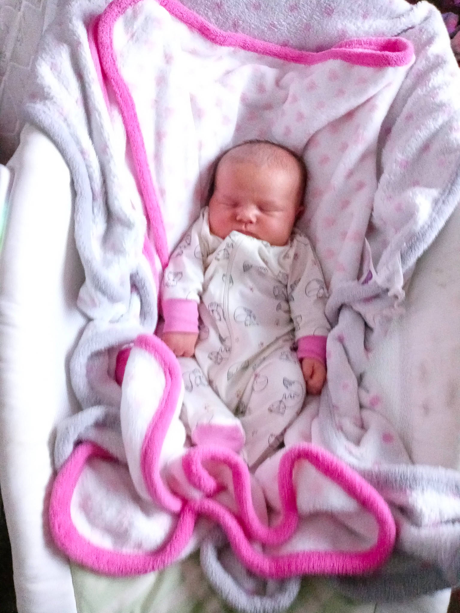 Amelia is registered to the contest to win money with this photo: baby, baby_sleeping, baby_toddler_clothing, cheek, comfort, face, head, headgear, iris, linens, lip, magenta, person, pink, product, purple, skin, sleeve, textile, toddler