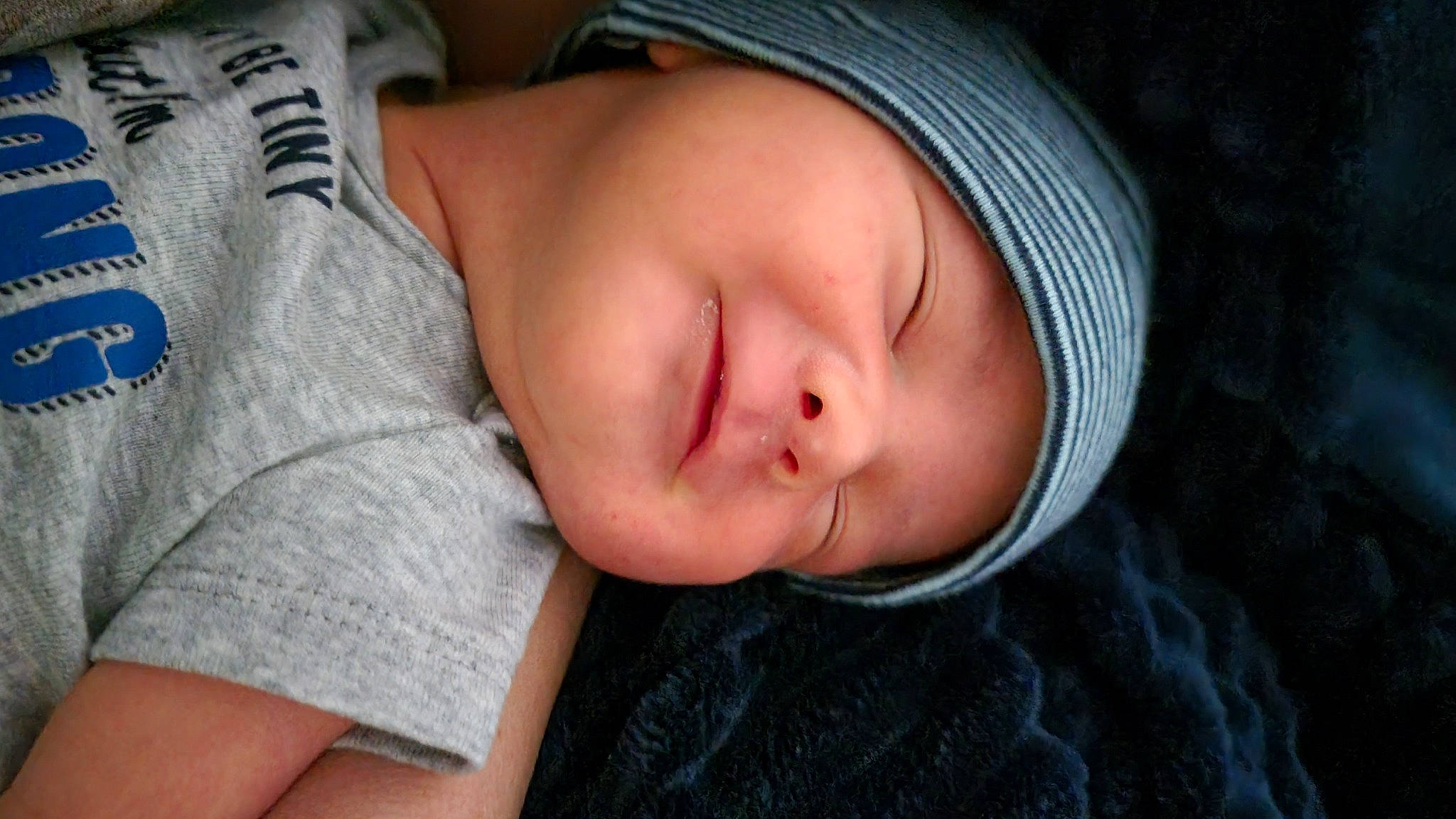 Westin is registered to the contest to win money with this photo: baby, baby_sleeping, baby_toddler_clothing, bedtime, cheek, child, comfort, eye, eyebrow, eyelash, hat, head, iris, linens, lip, nap, nose, person, skin, smile