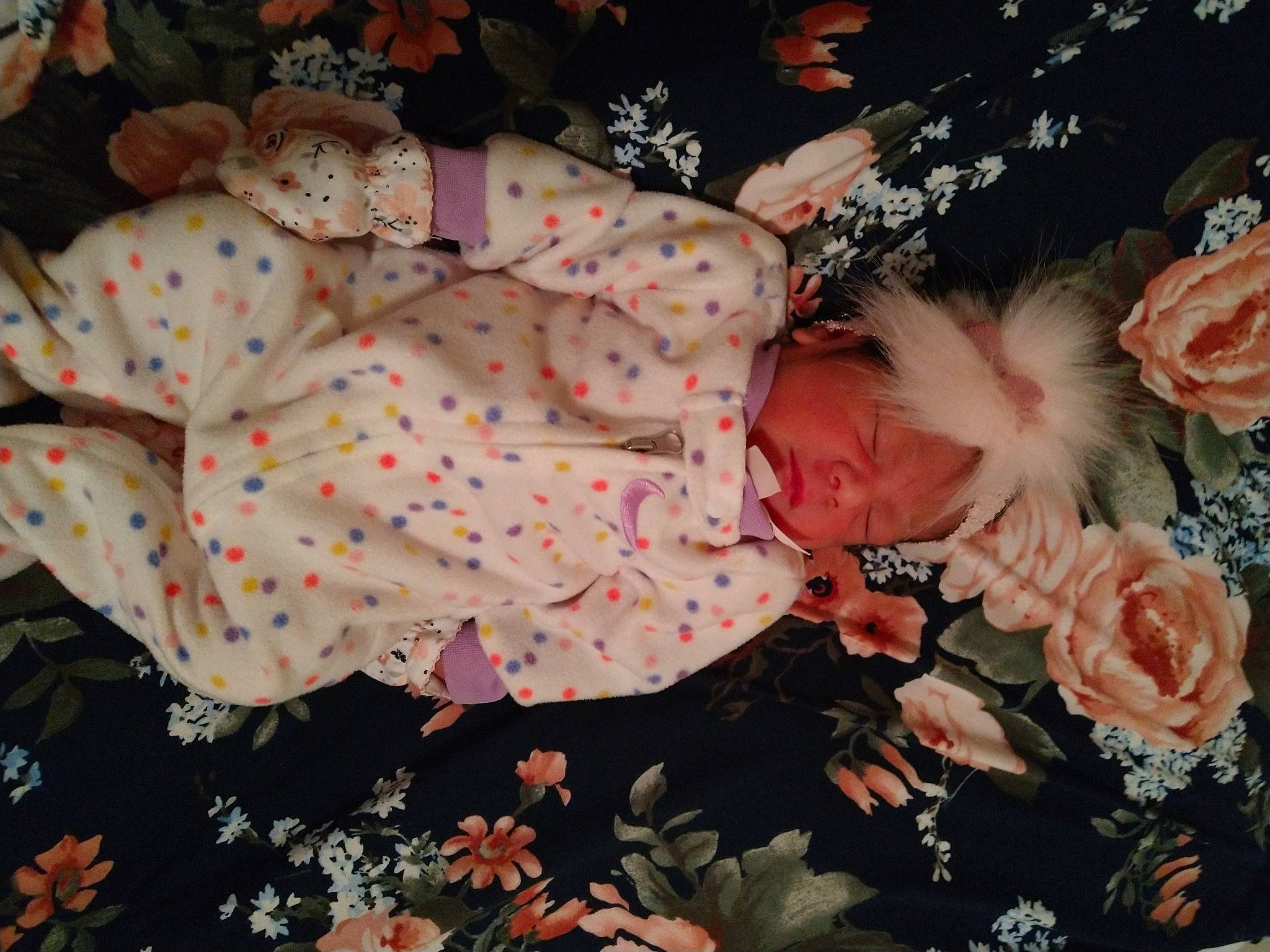 Abriana is registered to the contest to win money with this photo: baby, child, flower, headwear, pattern, person, pink, plant, textile