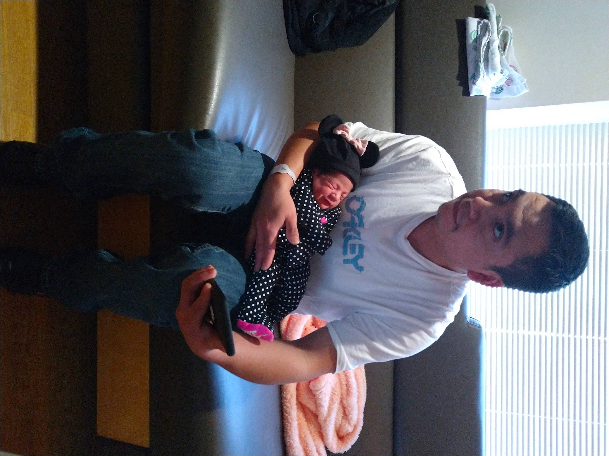 Abriana is registered to the contest to win money with this photo: arm, black_hair, gesture, headwear, leg, muscle, performance, person, photography, room, vacation