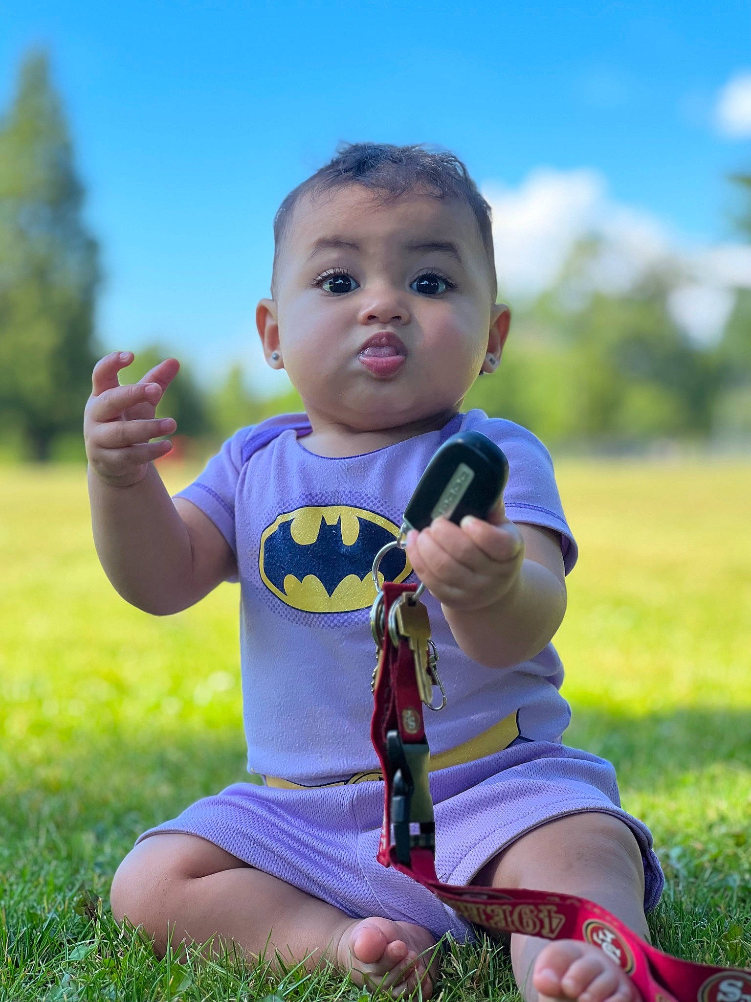 Mahina is registered to the contest to win money with this photo: baby, baby_toddler_clothing, child, cloud, electric_blue, eye, fun, grass, grassland, happy, leaf, leisure, meadow, people_in_nature, person, plant, skin, sky, sleeve, summer